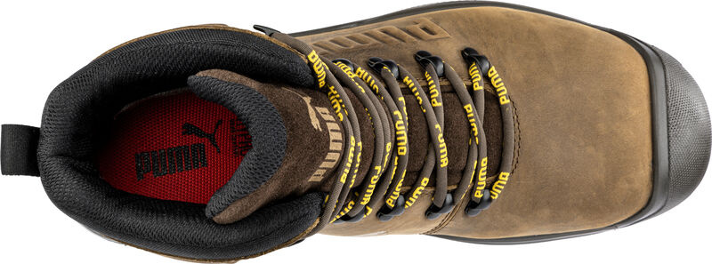 Trzewiki Puma Iron HD Brown Mid S3S 63.271.0 podczas pracy na zbrojeniu hali produkcyjnej